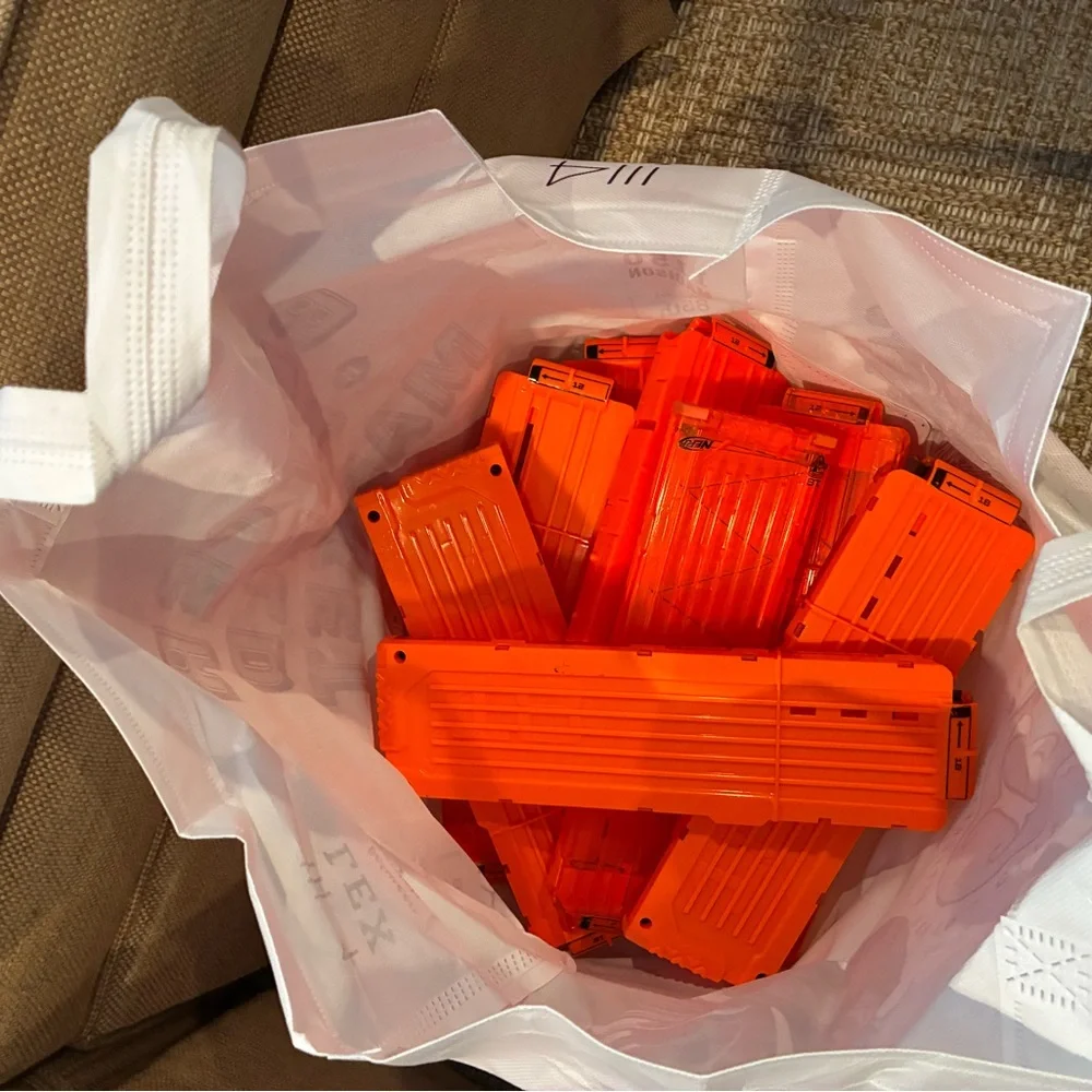 Nerf Arsenal, darts, goggles, mags, and multiple types of guns and attacments. - Picture 5 of 9